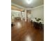 Open concept office or dining space with hardwood floors and natural light at 2479 Mitford Ct, Dacula, GA 30019