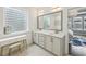 Chic bathroom with double sink vanity, modern fixtures, and ample natural light at 522 Hargrove Ln, Decatur, GA 30030