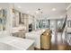 Spacious kitchen features a large island, stainless steel appliances, and flows into an open-concept living space at 522 Hargrove Ln, Decatur, GA 30030