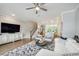 Open-concept living area showcases stylish decor, modern fixtures and seamless flow to kitchen at 522 Hargrove Ln, Decatur, GA 30030