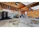 Spacious unfinished basement with exposed wood beams and concrete flooring, ready for customization and storage at 5971 Dogwood Se Dr, Acworth, GA 30102