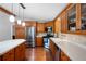 Bright kitchen with stainless steel appliances, light countertops, and hardwood floors at 5971 Dogwood Se Dr, Acworth, GA 30102