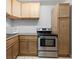 Traditional-style kitchen features wood cabinets and stainless steel appliances, offering functionality and warmth at 5971 Dogwood Se Dr, Acworth, GA 30102