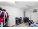 Neutral laundry room features storage shelving, hanging racks, and neutral colored walls at 5971 Dogwood Se Dr, Acworth, GA 30102