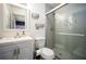 Modern bathroom with a glass-enclosed shower, sleek fixtures, and a contemporary vanity at 609 Hearth Pl, Lawrenceville, GA 30043