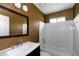 Bathroom featuring a vanity, mirror, toilet, and a shower/tub combo at 9550 Canvasback Ct, Jonesboro, GA 30238