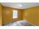 Bedroom featuring yellow walls and a window at 9550 Canvasback Ct, Jonesboro, GA 30238