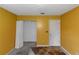 Bedroom featuring yellow walls and a closet at 9550 Canvasback Ct, Jonesboro, GA 30238