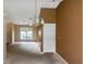 Dining room area featuring a chandelier and window at 9550 Canvasback Ct, Jonesboro, GA 30238
