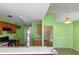 Bright kitchen featuring wooden cabinetry and a pass-through to another room at 9550 Canvasback Ct, Jonesboro, GA 30238