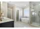 Beautiful bathroom with a standalone tub, marble countertops, and a glass-enclosed shower for spa-like comfort at 1253 Lucile Sw Ave, Atlanta, GA 30310