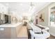Open-concept kitchen featuring a large island with seating, flowing into living space at 1253 Lucile Sw Ave, Atlanta, GA 30310