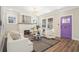 Stylish living room boasting a modern fireplace, comfortable seating, and ample natural light at 1253 Lucile Sw Ave, Atlanta, GA 30310