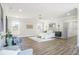 Spacious main bedroom features a cozy seating area, lots of natural light, and modern décor at 1253 Lucile Sw Ave, Atlanta, GA 30310