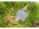 Aerial view of a private home with a manicured backyard and outdoor entertainment space at 2277 Lazy Days Rd, Dacula, GA 30019