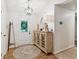 Welcoming foyer with stylish decor, hardwood floors, and a front door with decorative wreath at 2277 Lazy Days Rd, Dacula, GA 30019