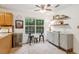 Modern kitchen with stainless steel appliances, granite countertops, and a breakfast bar at 2277 Lazy Days Rd, Dacula, GA 30019