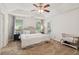 Spacious bedroom with tray ceiling, carpet, and private door to the backyard at 2277 Lazy Days Rd, Dacula, GA 30019