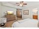 Bright bedroom features tray ceiling, ensuite bathroom, and ample closet space at 2277 Lazy Days Rd, Dacula, GA 30019