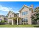 Exterior view of home with large lawn and covered patio at 585 Lawton Bridge Sw Rd, Smyrna, GA 30082