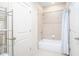 Cozy bathroom with bathtub and tiled shower combination at 585 Lawton Bridge Sw Rd, Smyrna, GA 30082