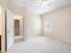 Spacious bedroom featuring neutral carpeting, closet space, and en-suite bath at 585 Lawton Bridge Sw Rd, Smyrna, GA 30082