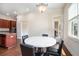 Eat in kitchen dining area includes a table with seating and lots of natural light at 585 Lawton Bridge Sw Rd, Smyrna, GA 30082