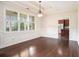 Dining room with large windows, hardwood floors, and decorative ceiling at 585 Lawton Bridge Sw Rd, Smyrna, GA 30082