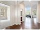 Bright foyer features hardwood floors and entry to living spaces at 585 Lawton Bridge Sw Rd, Smyrna, GA 30082