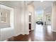 Bright hallway showcasing hardwood floors and architectural details at 585 Lawton Bridge Sw Rd, Smyrna, GA 30082