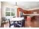 Charming eat-in kitchen features a dining table set near a window and stainless steel appliances at 585 Lawton Bridge Sw Rd, Smyrna, GA 30082