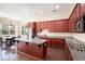 Kitchen with an island, granite countertops, and stainless steel appliances at 585 Lawton Bridge Sw Rd, Smyrna, GA 30082