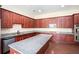 Gourmet kitchen featuring granite countertops, stainless steel appliances, and island at 585 Lawton Bridge Sw Rd, Smyrna, GA 30082