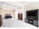 Spacious main bedroom with a ceiling fan, a large bed, and ample living space at 585 Lawton Bridge Sw Rd, Smyrna, GA 30082