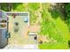 A furnished back deck overlooks a fenced-in yard at 6919 Mount Zion Rd, Waco, GA 30182