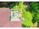Aerial view of a back deck with outdoor seating and a partially fenced-in yard at 6919 Mount Zion Rd, Waco, GA 30182