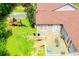 Aerial view of a backyard featuring a deck, patio doors, play set and above ground pool at 6919 Mount Zion Rd, Waco, GA 30182