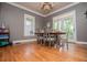 Spacious dining room with hardwood floors and elegant chandelier at 6919 Mount Zion Rd, Waco, GA 30182