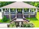 Charming home featuring a welcoming front porch, landscaped garden, and inviting entrance at 6919 Mount Zion Rd, Waco, GA 30182