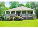 Beautiful home with a cozy front porch, perfect for enjoying the serene surroundings at 6919 Mount Zion Rd, Waco, GA 30182