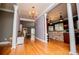 The foyer features hardwood floors and leads to the kitchen at 6919 Mount Zion Rd, Waco, GA 30182