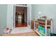 Hallway with French doors that lead to an open layout at 6919 Mount Zion Rd, Waco, GA 30182