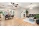 Bright living room with hardwood floors, a cozy fireplace, and plenty of space for entertaining at 8740 Roswell Rd # 2G, Atlanta, GA 30350