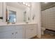 Bathroom with a double vanity and a separate toilet and shower area at 113 Gold Bridge Xing, Canton, GA 30114