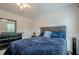 Bedroom featuring carpet, a bed, and a window letting in natural light at 113 Gold Bridge Xing, Canton, GA 30114