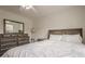 Neutral bedroom with natural light and features a dresser with mirror at 113 Gold Bridge Xing, Canton, GA 30114