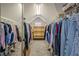 Attic closet with lots of shelving to organize all your clothing items at 113 Gold Bridge Xing, Canton, GA 30114