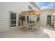 Enjoy outdoor dining on the deck featuring comfortable seating and a charming backyard view at 113 Gold Bridge Xing, Canton, GA 30114