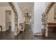 Elegant foyer with dark wood floors and unique stone archways at 113 Gold Bridge Xing, Canton, GA 30114