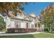 Charming two-story home with stone accents, manicured lawn and inviting front porch at 113 Gold Bridge Xing, Canton, GA 30114